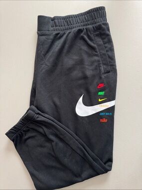 Nike Black Jogger Sweatpants with White Swoosh and Multicolor Logos